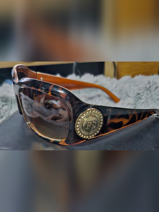 Franco Sarto Accessories - Franco Sarto Tortoiseshell Sunglasses with Gold Medallion